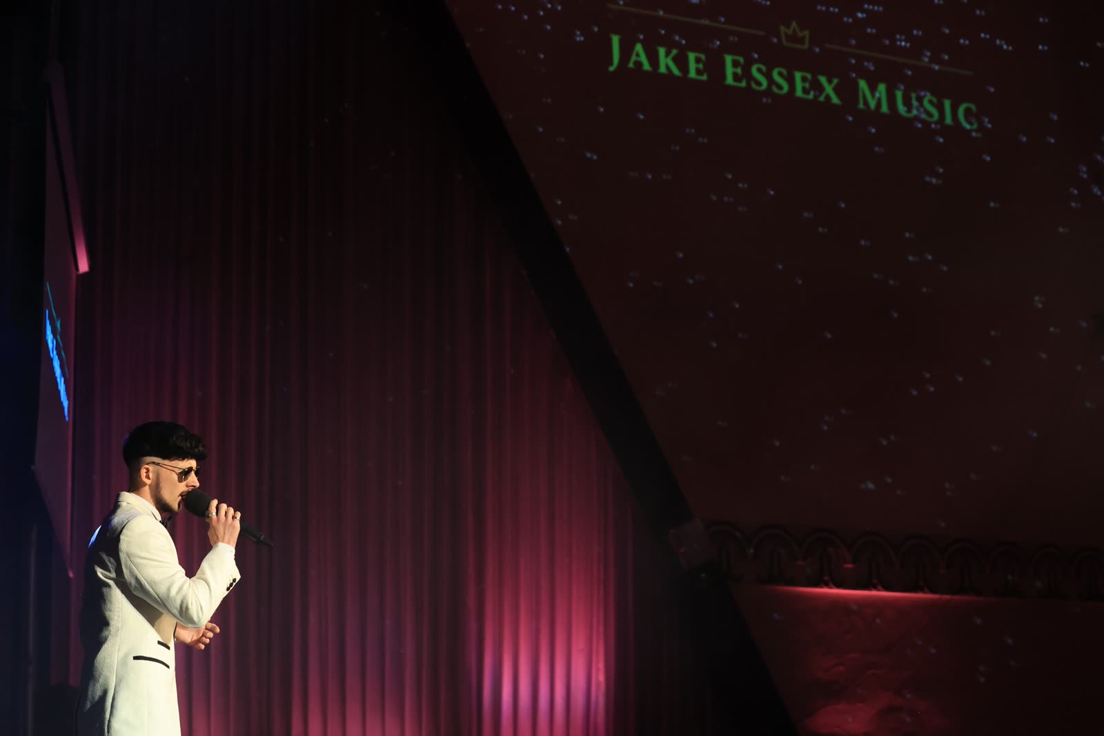 Jake Essex, burgundy stage light